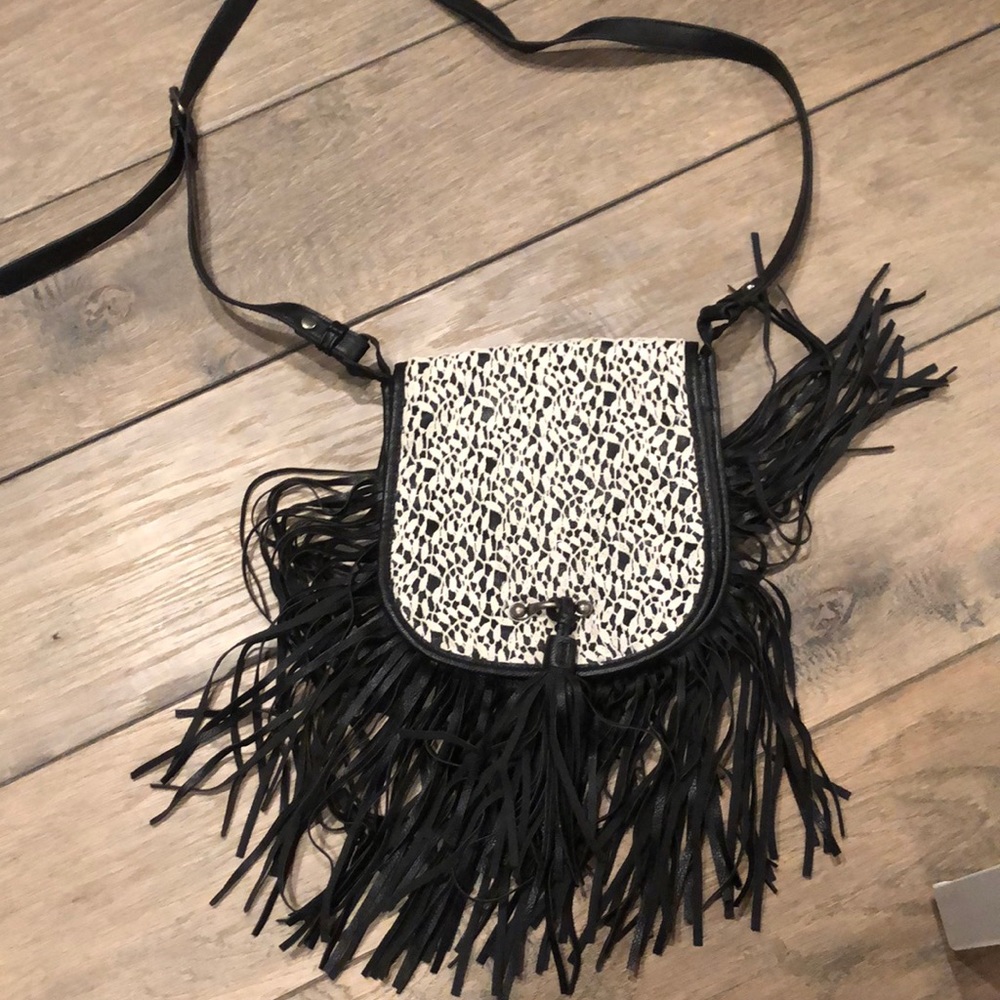 Madden Girl fringe purse.